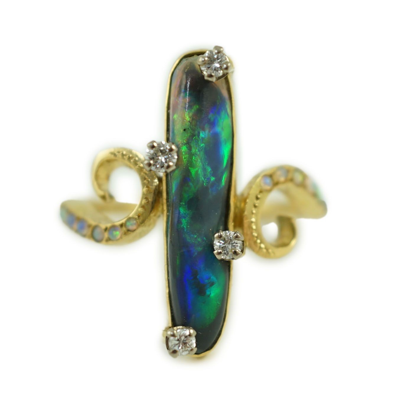 A stylish early to mid 20th century 18ct gold, black opal and diamond chip set dress ring